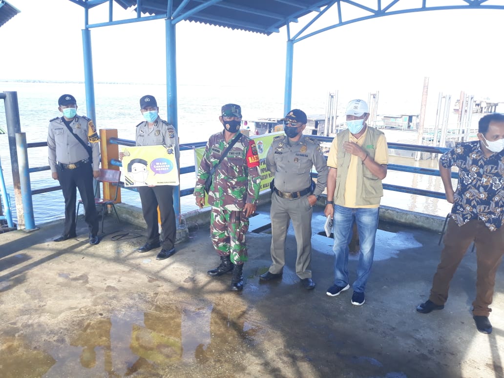 Hindari Penyebaran Covid-19 di Wilkum, Polsek Kuala Kampar Terus Awasi Prokes Warga