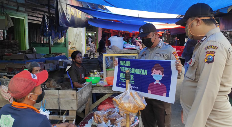 Polsek Langgam Gelar Patroli Pencegahan Aksi Kriminal C3 dan Penyebaran Covid-19