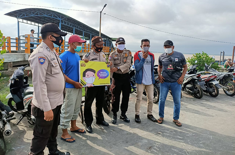Polsek Kuala Kampar Minta Warga di Dermaga Penyalai Selalu Patuhi Protokol Kesehatan