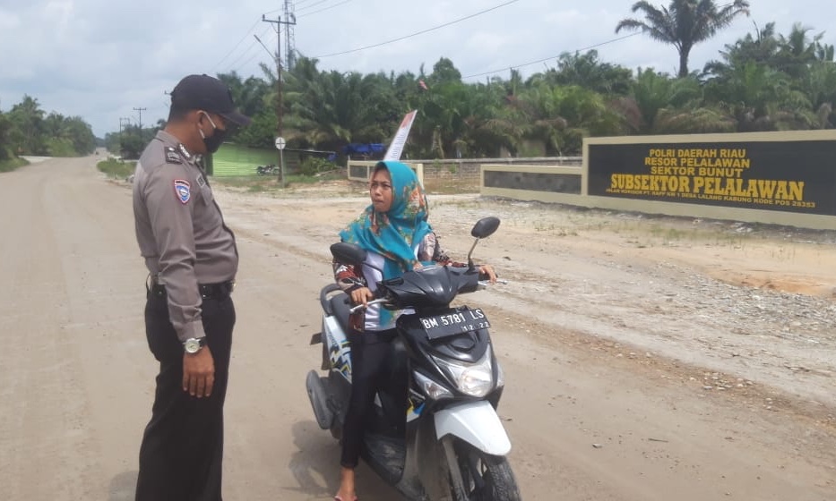 Polsubsektor Pelalawan Gelar Pendisiplinan Protokol Kesehatan Terhadap Masyarakat