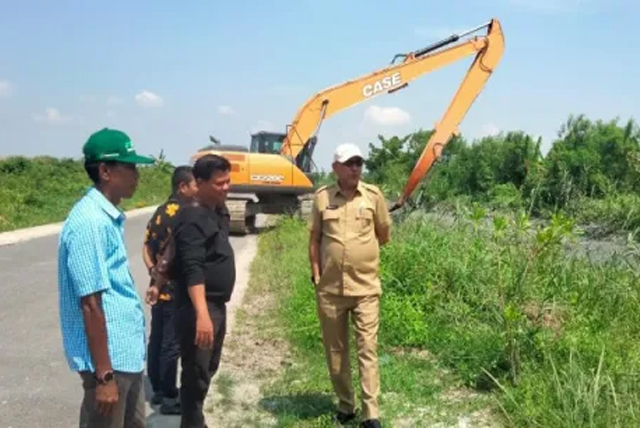 Dinas PUTR Rohil Lakukan Normalisasi Sungai dan Parit di Kecamatan Bangko dan Sinaboi
