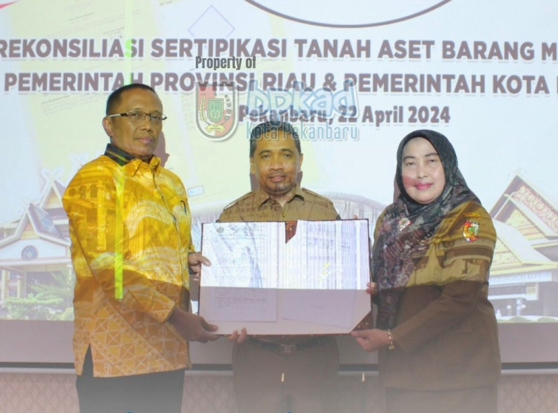 Kepala BPKAD Pekanbarum Yulianis Tandatangani Rekonsiliasi Aset Tanah di Kantor BPN Kota Pekanbaru
