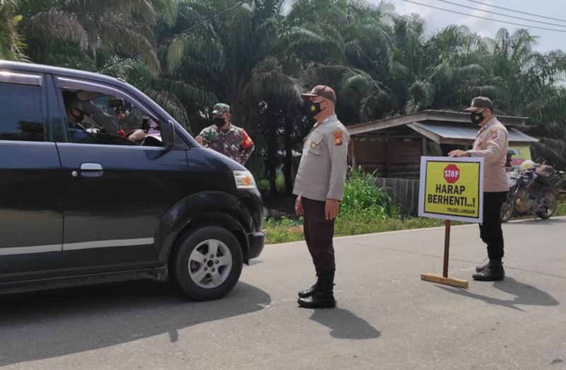 Polsek Langgam Terjun Langsung Lakukan Kegiatan PPKM