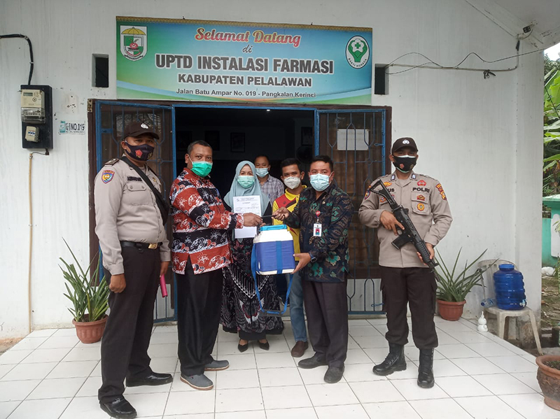 Polsek Bunut Lakukan Pengawalan Pendistribusian Vaksin Covid-19