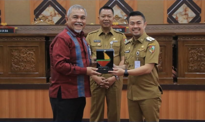Kepala BPKAD Pekanbaru Tandatangani MoU Layanan Jasa Perbankan dengan Bank Riau Kepri Syariah