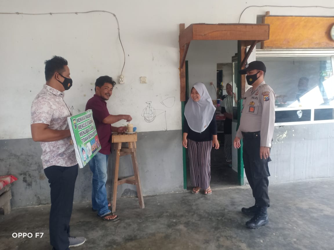 Pastikan Penerapan Prokes, Polisi di Bandar Sei Kijang Pantau Tempat Usaha