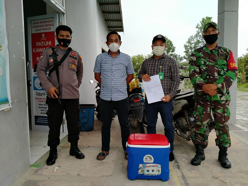 Polsek Bunut Kawal Pendistribusian Vaksin Covid-19